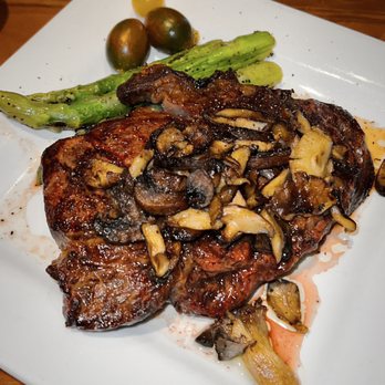 Woodfire Grille - steak with mushrooms and asparagus - Cocktail Bars Near Me - Dubuque, Iowa Woodfire Grille - steak with mushrooms and asparagus - Cocktail Bars Near Me - Dubuque, Iowa