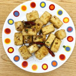 a plate of tofu with chili