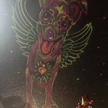 Flores Cafe - Dante from the movie Coco painted on the ceiling. - Mexican Near Me - Carson, California
