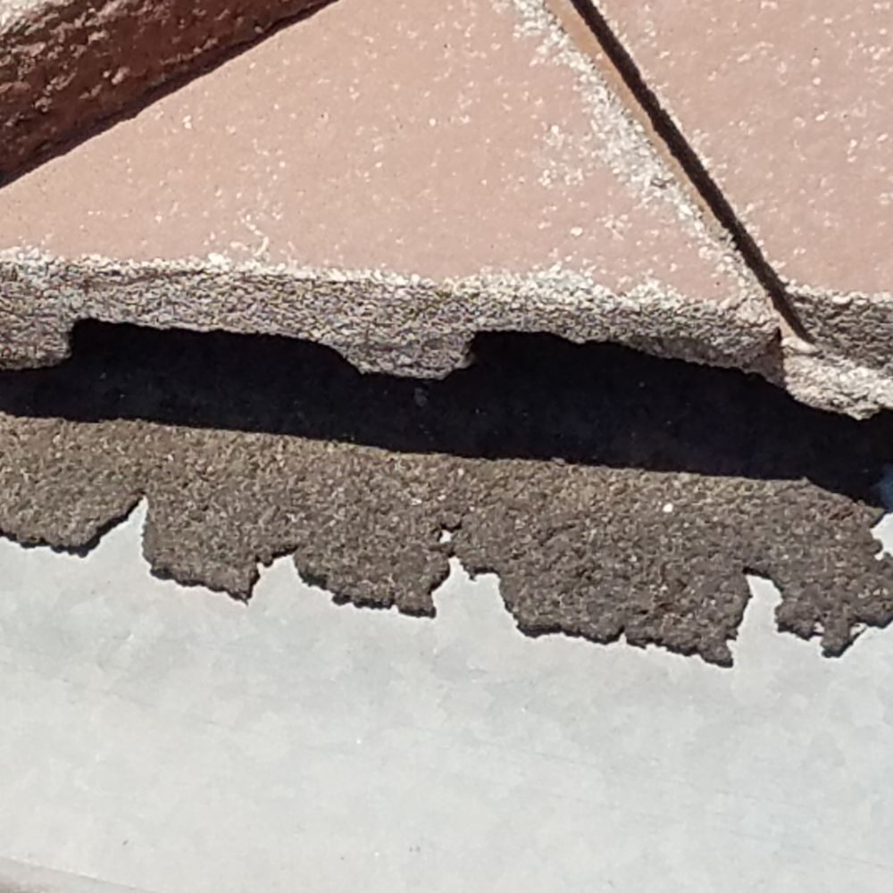 Slide of Oscar's Roofing