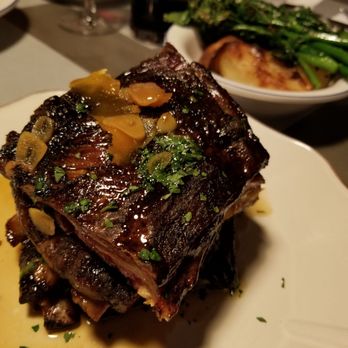 Parcheggio - HONEY GARLIC SMOKED LAMB RIBS (with a side of roast potatoes and rapini) - Italian Near Me - Toronto, Ontario Parcheggio - HONEY GARLIC SMOKED LAMB RIBS (with a side of roast potatoes and rapini) - Italian Near Me - Toronto, Ontario
