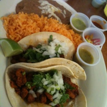 Border Grill Fresh-Mex - El Pastor Tacos w/ beans, rice and an assortment of hot sauces - Tacos Near Me - Orlando, Florida
