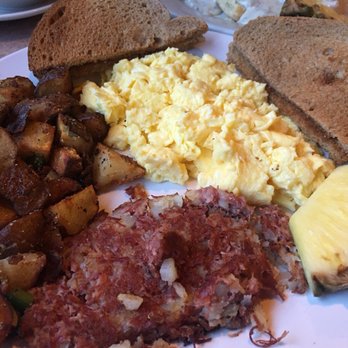 Lisa's Cafe - Corned beef hash breakfast with a side of biscuits and gravy - Breakfast & Brunch Near Me - Madeira Beach, Florida