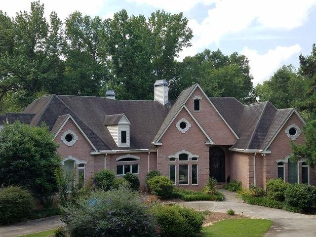Slide of Craftsman Roofing and Restoration