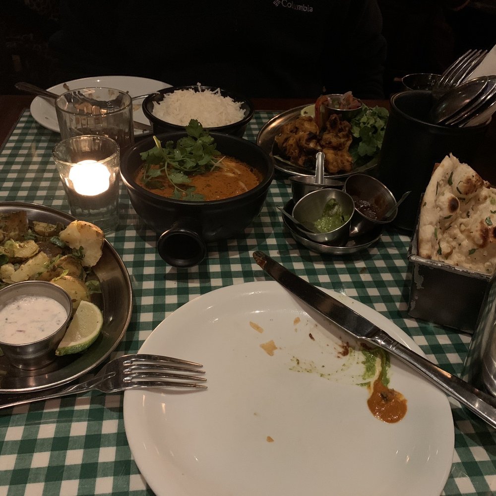 Dishoom - Gunpowder potatoes, Dishoom Chicken Tikki, Chicken Ruby, garlic naan, and basmati rice. - Indian Near Me - Edinburgh, EDH