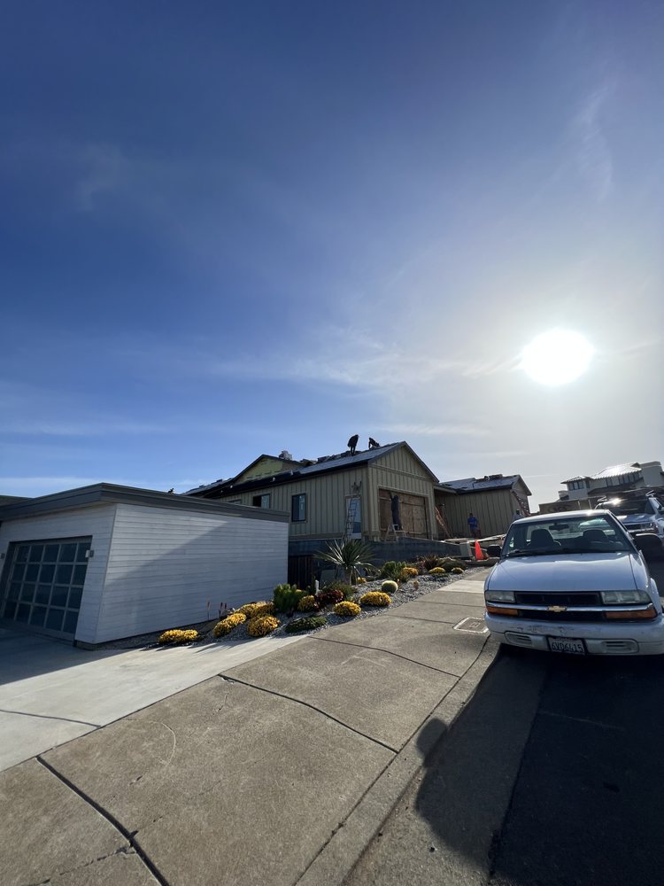 Slide of E Sanchez roofing