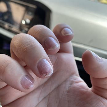 Canvas Nails & Spa - The broken nail. It is broken all the way into the nail bed... she didn't even bother to at least cut it down so it won't snag on things. - Nail Salons Near Me - Chandler, Arizona