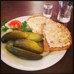 Pijalnia Wódki i Piwa - Surprise - brown bread with lard, served with pickled cucumber
