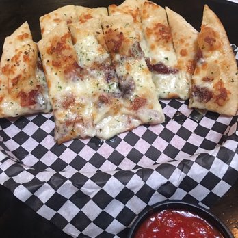 Black Sky Brewery - Cheesy bread app with bacon duh! - Breweries Near Me - Denver, Colorado
