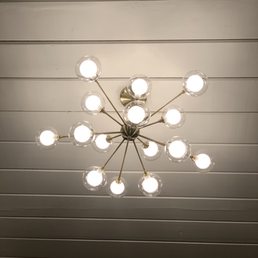 a chandelier with a lot of light bulbs