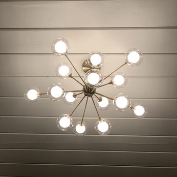 Premier Solutions Company - a chandelier with a lot of light bulbs - Painters Near Me - East Palo Alto, California