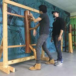 Wing Chun Kali System - Wing Chun, wooden man, martial arts, self defense, Chinese, One on one training, class, mind and body exercise, training.