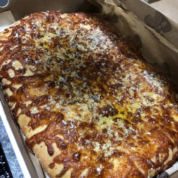 Marco's Pizza - Cheezy Bread - Honestly we were so turned off by the color, we ate about 1/10th of this. 2/5. - Pizza Near Me - Frisco, Texas Marco's Pizza - Cheezy Bread - Honestly we were so turned off by the color, we ate about 1/10th of this. 2/5. - Pizza Near Me - Frisco, Texas