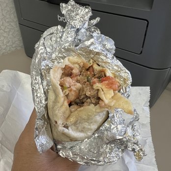 La Taqueria - Half eaten burrito - Mexican Near Me - Turlock, California La Taqueria - Half eaten burrito - Mexican Near Me - Turlock, California