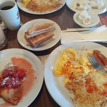 Denny's - All-American Slam, biscuits and gravy, wheat toast, crepes, with sunny side up eggs, bacon, and hash browns. Coffee and grapefruit juice. - American Near Me - Chula Vista, California Denny's - All-American Slam, biscuits and gravy, wheat toast, crepes, with sunny side up eggs, bacon, and hash browns. Coffee and grapefruit juice. - American Near Me - Chula Vista, California