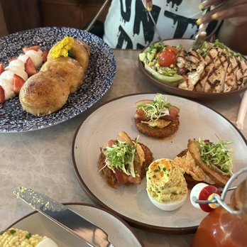 Yardbird - Crème brûlée, waffles, fried green, tomato, BLT wedge salad with grilled chicken and deviled eggs - Southern Near Me - Dallas, Texas Yardbird - Crème brûlée, waffles, fried green, tomato, BLT wedge salad with grilled chicken and deviled eggs - Southern Near Me - Dallas, Texas