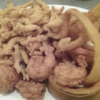 Captain Steve's - Jumbo shrimp and claim strips with onion rings and hush puppies. It was so good!!!. A lot of food. I took some home;-) - Seafood Near Me - Fort Mill, South Carolina