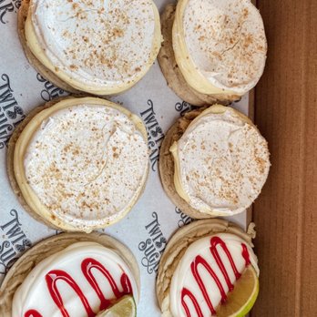 Twisted Sugar - a box of cookies with icing and a slice of lime - Bakeries Near Me - Meridian, Idaho