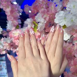 Nails of America - Pink chrome nail set with bow decal