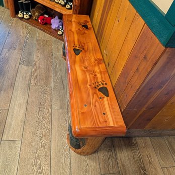 Black Bear Diner Downey - Bench with bear footprints - Diners Near Me - Downey, California