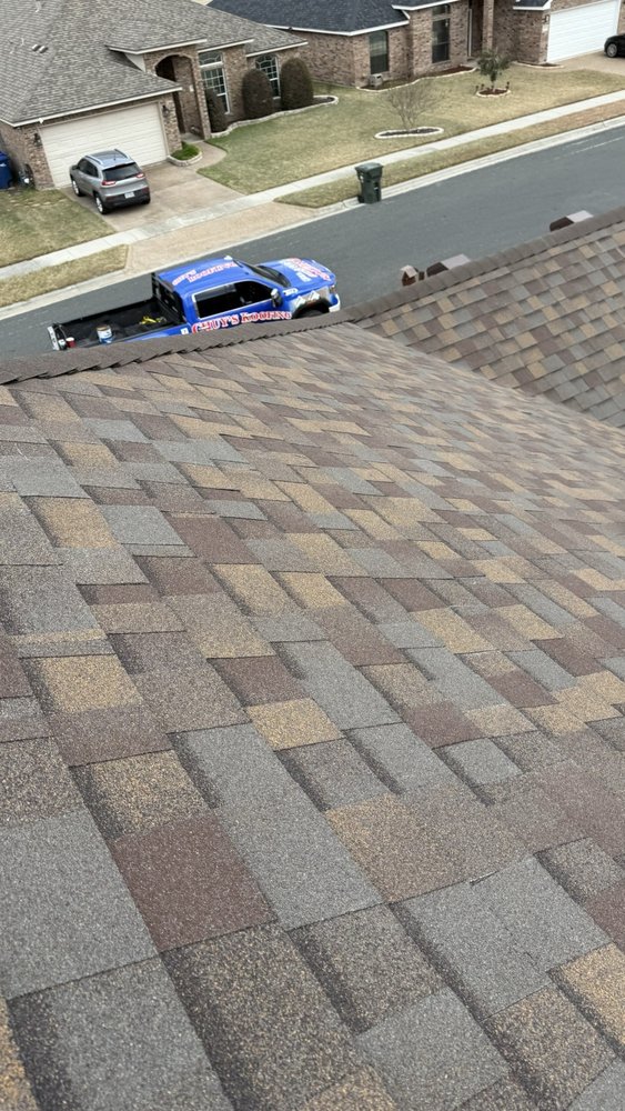 Slide of Chuy's Roofing