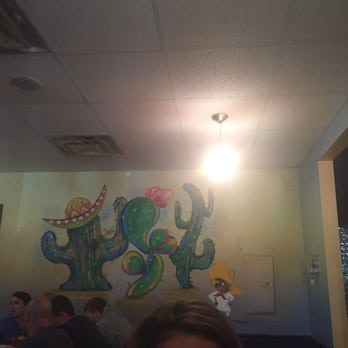 Mesa Cafe and Grill - Nicely hand crafted art work on the wall paired with cute interior decor to match the Mexican theme. - Breakfast & Brunch Near Me - Cranston, Rhode Island Mesa Cafe and Grill - Nicely hand crafted art work on the wall paired with cute interior decor to match the Mexican theme. - Breakfast & Brunch Near Me - Cranston, Rhode Island