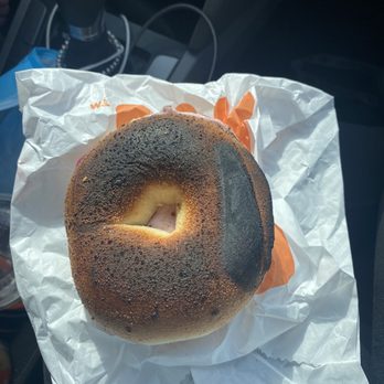 Dunkin' - A "toasted" plain bagel with cream cheese - Donuts Near Me - Lutz, Florida Dunkin' - A "toasted" plain bagel with cream cheese - Donuts Near Me - Lutz, Florida