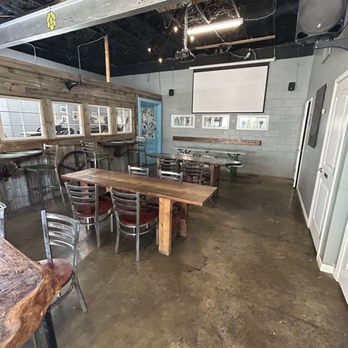 Flywheel Brewing - tables and chairs in a large room - Brewpubs Near Me - Elizabethtown, Kentucky