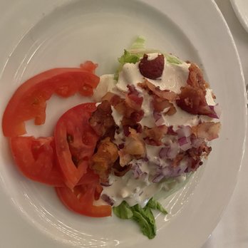 Larkin's - Wedge salad with blue cheese dressing - Steakhouses Near Me - Greenville, South Carolina Larkin's - Wedge salad with blue cheese dressing - Steakhouses Near Me - Greenville, South Carolina
