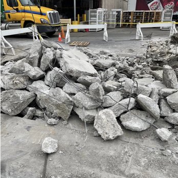 Stiefel Construction - a pile of rocks in front of a building - Masonry/Concrete Near Me Stiefel Construction - a pile of rocks in front of a building - Masonry/Concrete Near Me