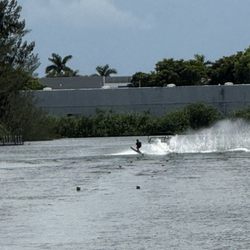 Novu Fusion - People riding the water, riding the waves on a boat