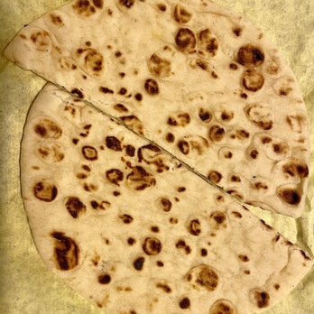 Gyros Town Restaurant - Pita bread that cane with the Appetizer Sampler Plate - Mediterranean Near Me - Denver, Colorado Gyros Town Restaurant - Pita bread that cane with the Appetizer Sampler Plate - Mediterranean Near Me - Denver, Colorado