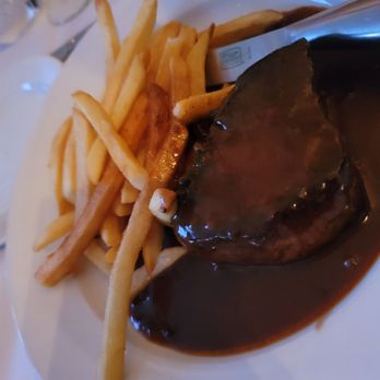 Bistro Moulin - Filet mignon, supposed to be medium rare but outer parts were completely burnt - Wine Bars Near Me - Monterey, California