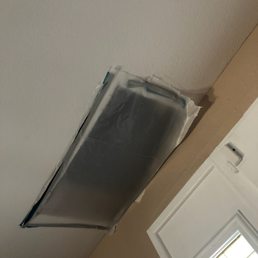 Had to cut holes in ceiling to repair water damage Had to cut holes in ceiling to repair water damage
