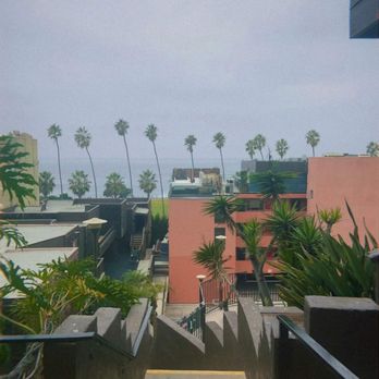La Jolla Cove Suites - The pink building is the main hotel. This is shot outside the terrace suite. Our "ocean view" the room came with. - Hotels Near Me - La Jolla, California La Jolla Cove Suites - The pink building is the main hotel. This is shot outside the terrace suite. Our "ocean view" the room came with. - Hotels Near Me - La Jolla, California