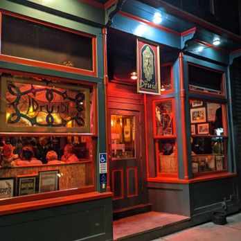 The Druid - the outside of a restaurant at night - Irish Pub Near Me - Cambridge, Massachusetts
