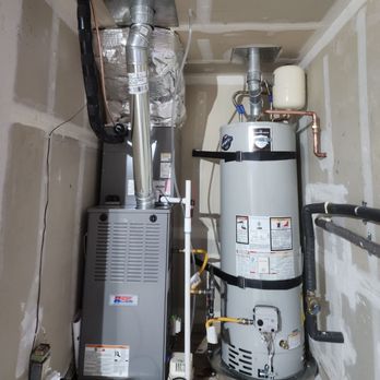 Flo Pro - A Heil furnace and AC system with a Bradford White water heater installation we recently completed - Plumbing Near Me