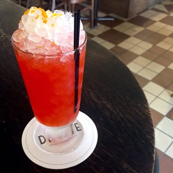 Dante - Negroni Frappe on pebble ice with "fluffy" orange juice. - Cocktail Bars Near Me - New York, New York