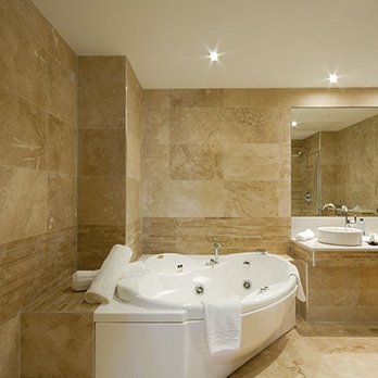 Emerald Isle Construction & Tile - a bathroom with a jacuzzi tub - General Contractors Near Me - Seattle, Washington Emerald Isle Construction & Tile - a bathroom with a jacuzzi tub - General Contractors Near Me - Seattle, Washington