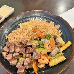 Yoka Japanese Sushi Bar & Steak House - Steak (NY Strip) Hibactchi: came with soup and salad and everything up u see on the in plate.