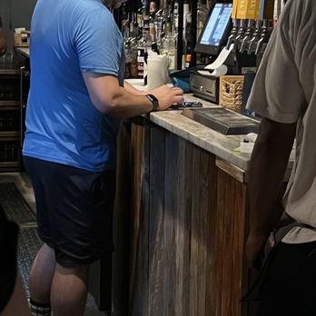 Aire Rooftop Bar - Bartender texting all night - Wine Bars Near Me - Chicago, Illinois Aire Rooftop Bar - Bartender texting all night - Wine Bars Near Me - Chicago, Illinois