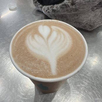 Blue Bottle Coffee - Wolf Point - Is it a leaf? A flower? An onion? Prayer hands with a heart? - Coffee & Tea Near Me - Chicago, Illinois