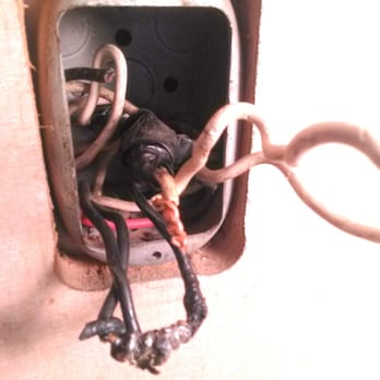 R Power Services - Our ancient electrical wiring. Note the solder joint, and loose black wire. R. Power Service reconnected everything properly. - Electricians Near Me - La Crescenta, California
