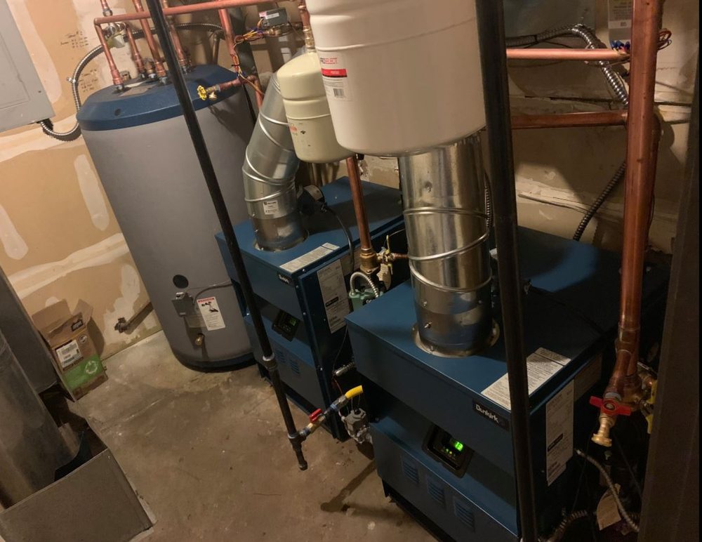 Slide of Mighty Plumbing, Heating, Air & Electric