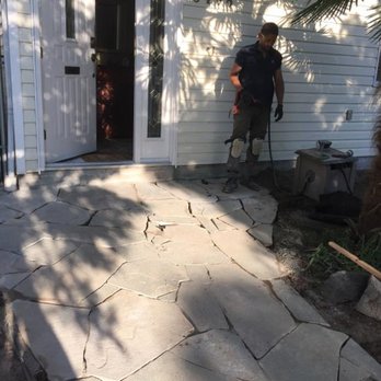 Peace Garden - a man standing in front of a house - Gardeners Near Me - Vancouver, British Columbia Peace Garden - a man standing in front of a house - Gardeners Near Me - Vancouver, British Columbia