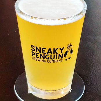 Sneaky Penguin Brewing - Happy Wheat - Citrusy Wheat brew, perfect Summer crusher. - Breweries Near Me - Raleigh, North Carolina