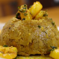 Juana's Restaurant - Mofongo is a dish made of mashed plantains that can be served with chicken, cheese, fried pork belly slices, shrimp or all the above!