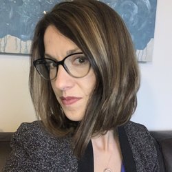 Legacy Hair Salon - Layered Bob, dark low light on front framing face with honey and some blonde highlights throughout.