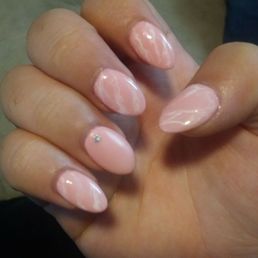 I got a shorter almond shape with a marble design. Lisa did great and Amy threw in the gems for free!