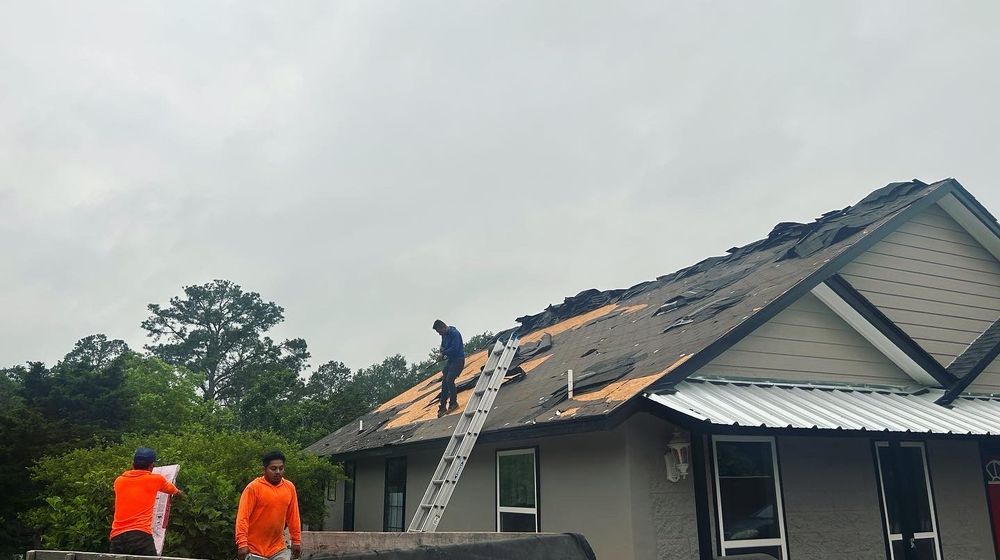 Slide of DE AL Roofing